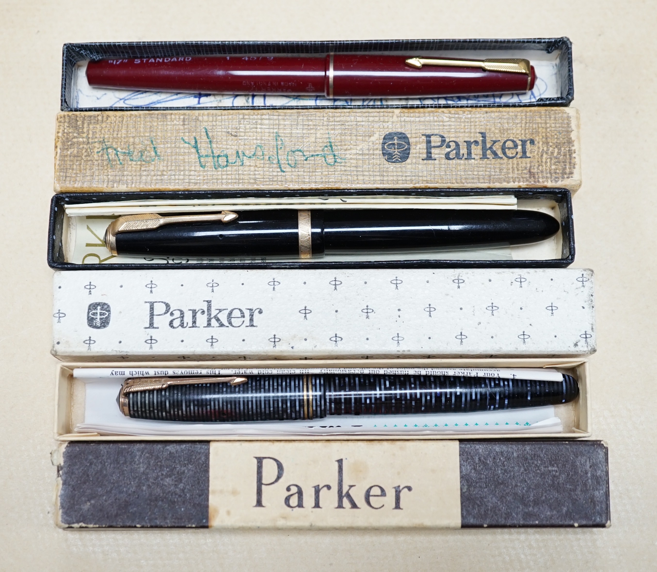 Eight boxed Parker fountain pens and fourteen others unboxed, a lady's Rotary wristwatch and silver pendant. Condition - fair